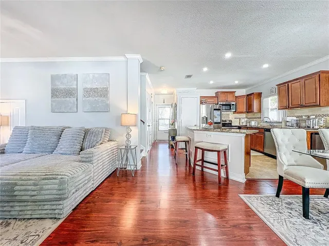 a view of an entryway with wooden floor