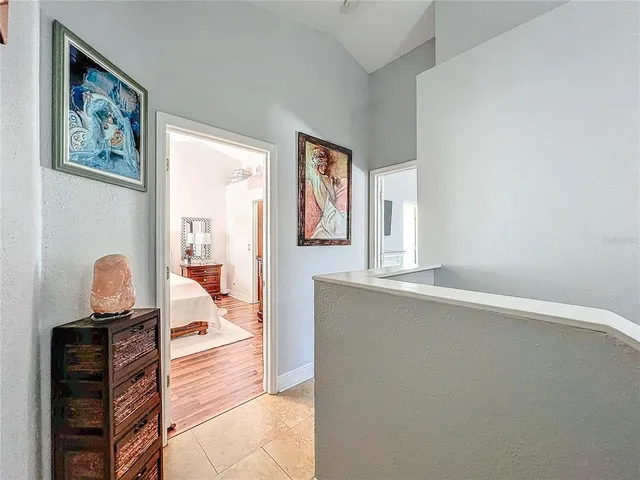 a bedroom with a bed and a fireplace