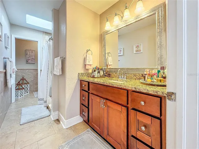 a view of a backyard with sitting area