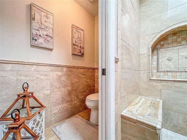 a room with furniture and a flat screen tv