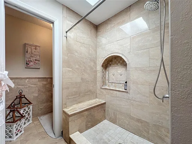 a kitchen with a table and chairs