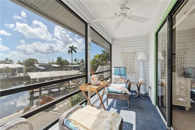 a bathroom with a sink a toilet and a window