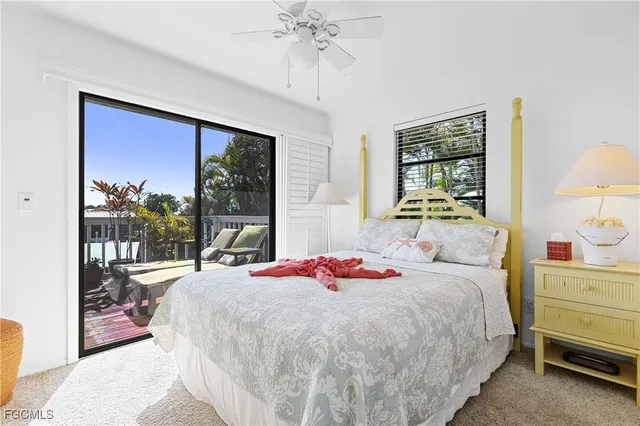 a bathroom with a toilet a sink and shower