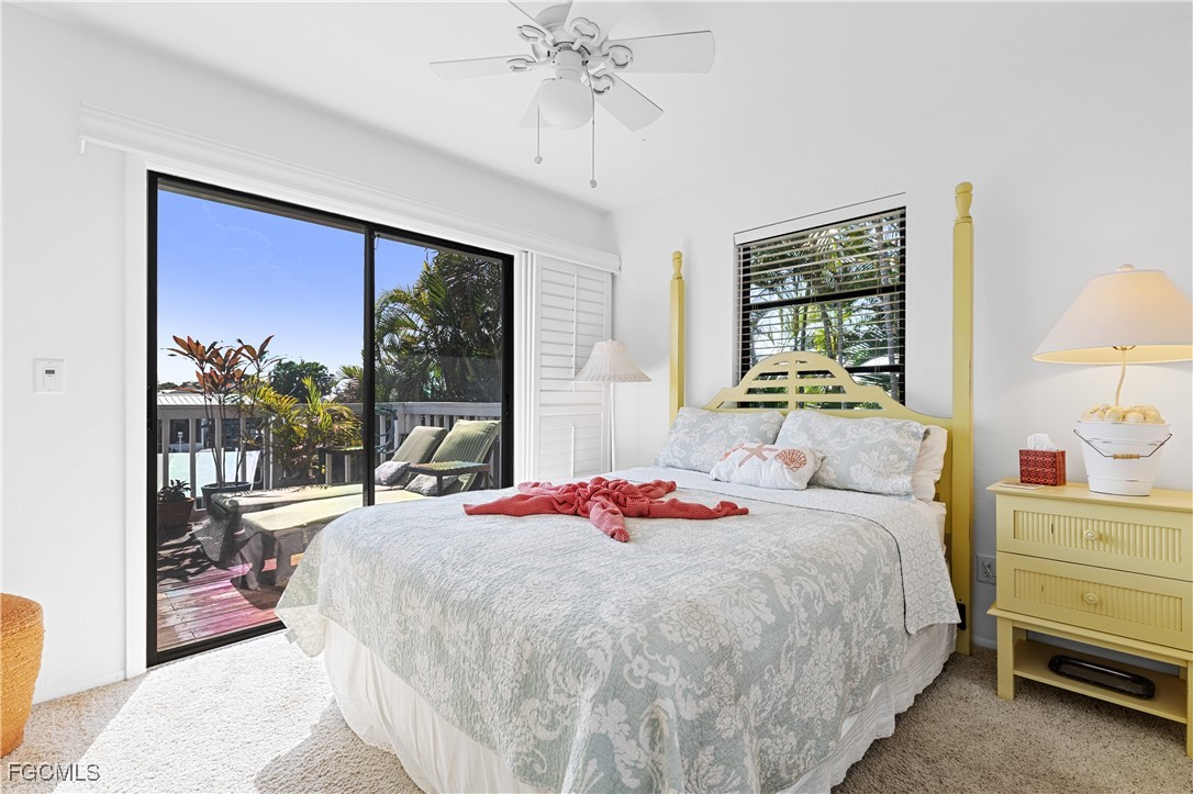 2831 Janet Street Matlacha, FL 33993 - Photo 21 of 43 a bedroom with a bed and a window