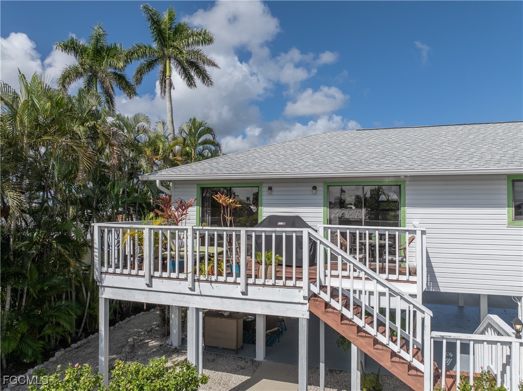 2831 Janet Street Matlacha, FL 33993 - Photo 23 of 43 a view of a house with a deck