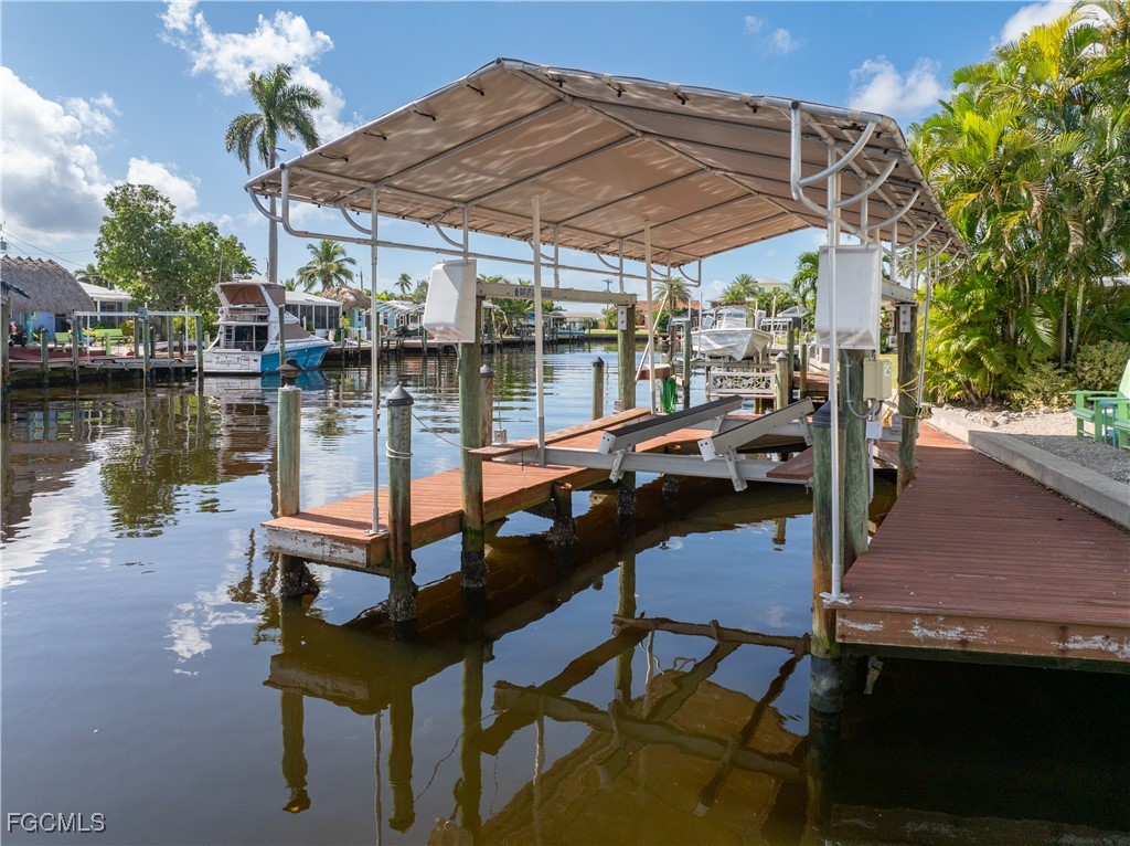 2831 Janet Street Matlacha, FL 33993 - Photo 30 of 43 a view of a swimming pool with a patio