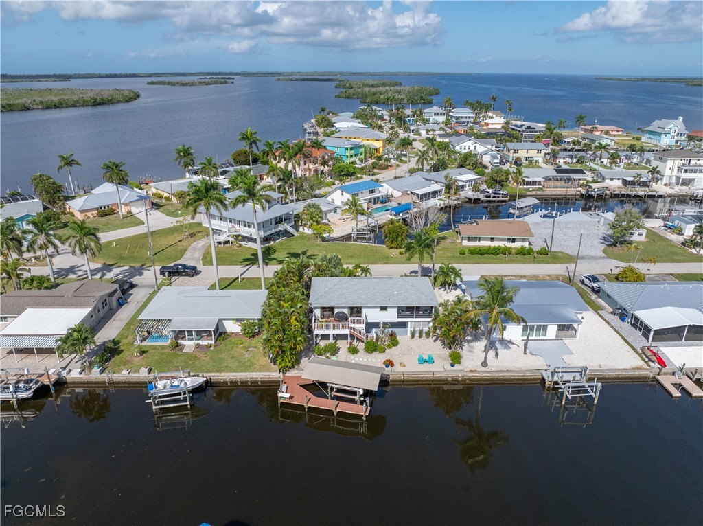 2831 Janet Street Matlacha, FL 33993 - Photo 36 of 43 an aerial view of residential house with outdoor space and swimming pool