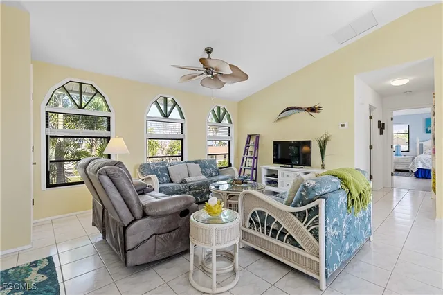 a living room with furniture and a table