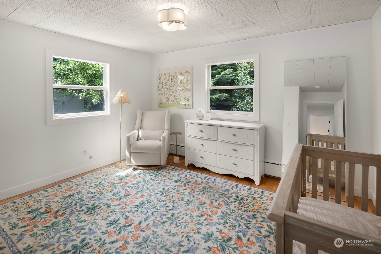 1417 North 40th Street Renton, WA 98056 - Photo 17 of 33 a living room with furniture and a dresser