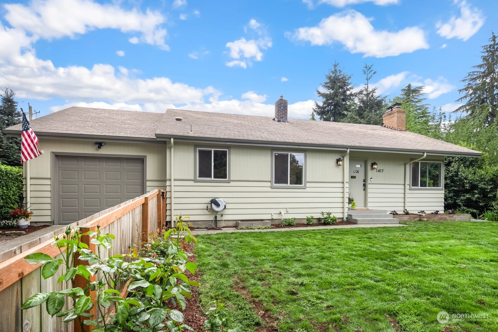 1417 North 40th Street Renton, WA 98056 - Photo 2 of 33 a front view of house with yard