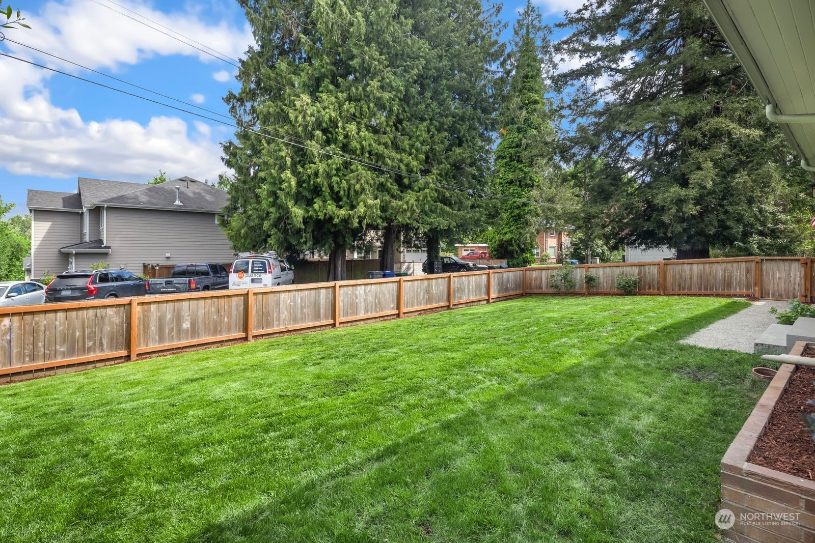 1417 North 40th Street Renton, WA 98056 - Photo 29 of 33 a view of yard with grass and trees