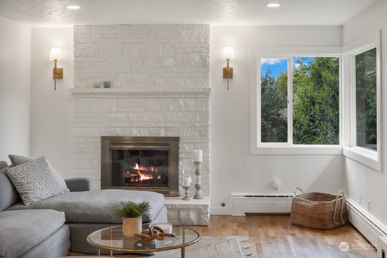 1417 North 40th Street Renton, WA 98056 - Photo 5 of 33 a living room with furniture and a fireplace