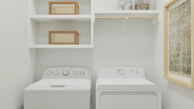 a utility room with dryer and washer