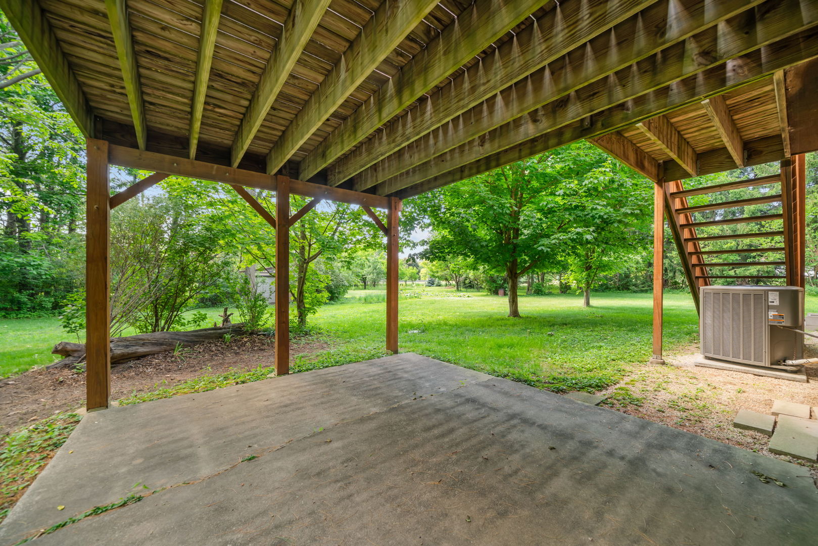 5748 South Skare Road Rochelle, IL 61068 - Photo 36 of 45 a view of a house with backyard and a tree