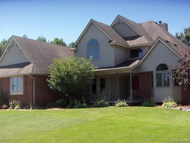 8112 Lee Road Brighton, MI 48116 - Photo 1 of 30 Front-large porch.JPG