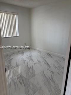 17365 Southwest 142nd Court Miami, FL 33177 - Photo 13 of 18 a view of an empty room