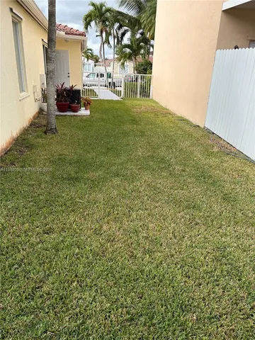 a view of yard with seating area