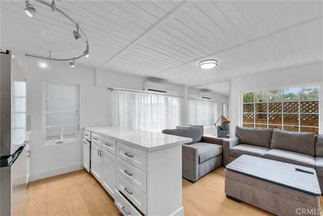 a kitchen with sink and window