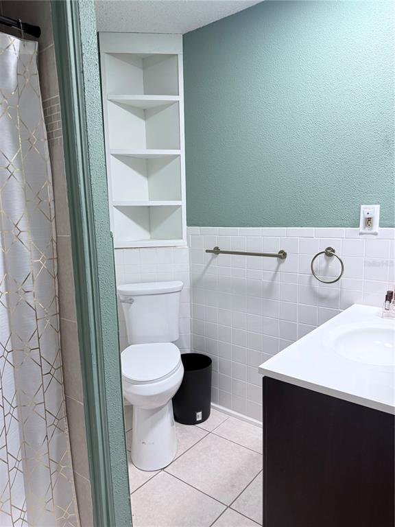 1420 Belleview Road Cocoa, FL 32922 - Photo 12 of 14 a bathroom with a toilet and a sink