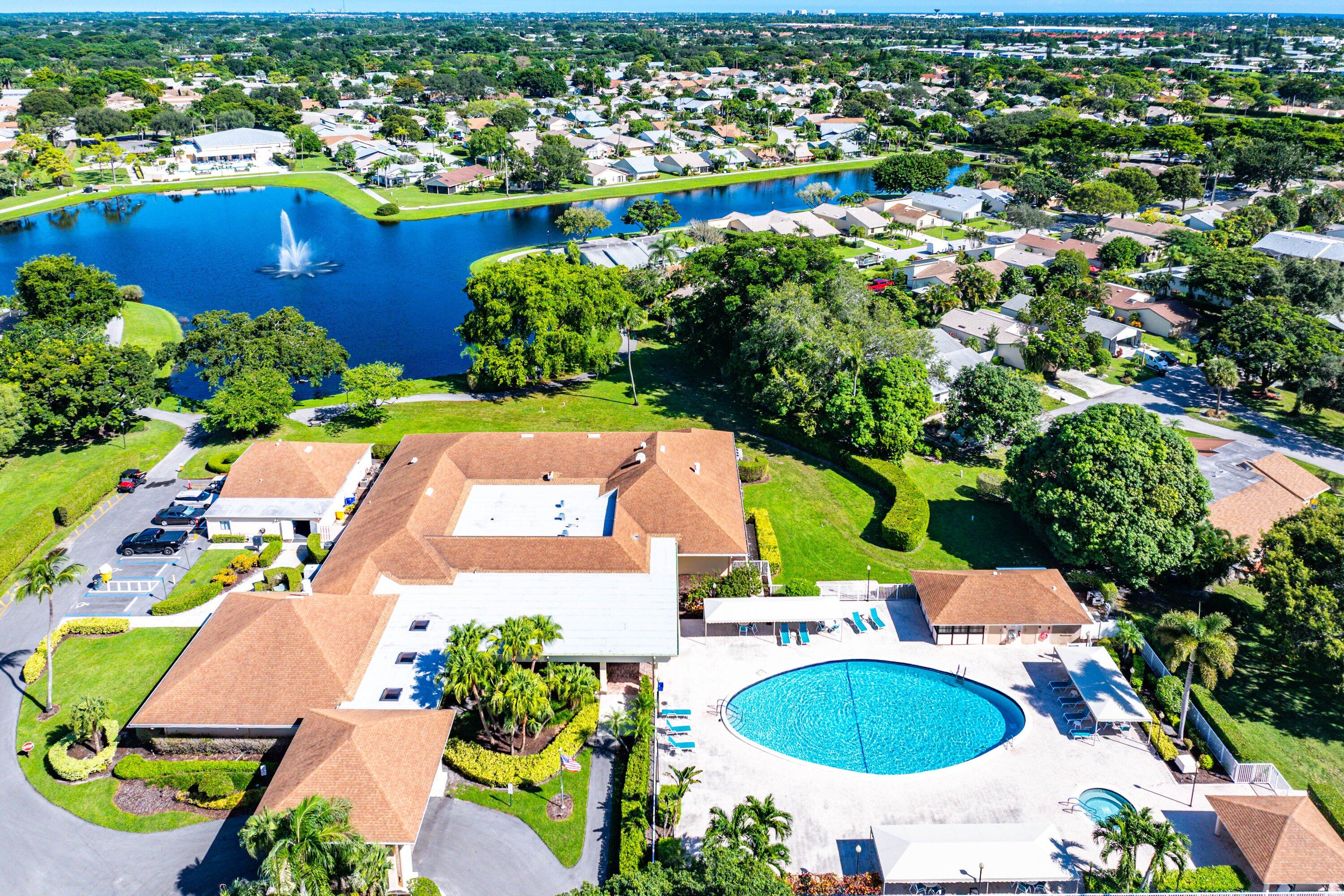 865 Northwest 29th Avenue, Unit D Delray Beach, FL 33445 - Photo 40 of 70 an aerial view of residential house with outdoor space and swimming pool