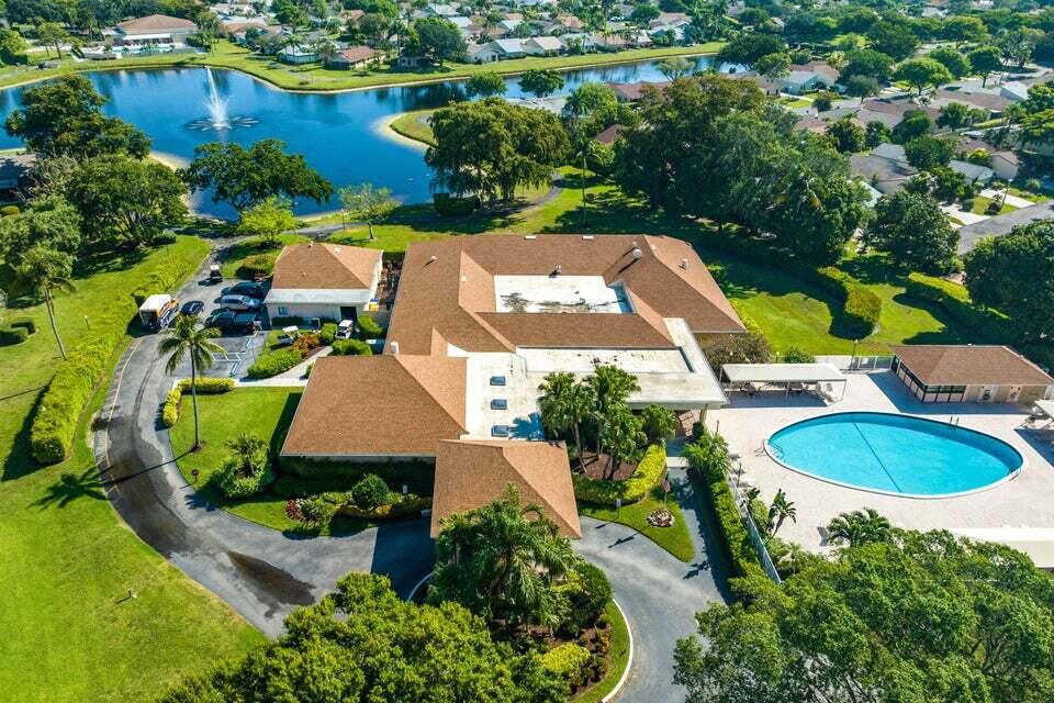 865 Northwest 29th Avenue, Unit D Delray Beach, FL 33445 - Photo 48 of 70 an aerial view of a house with yard swimming pool and outdoor seating