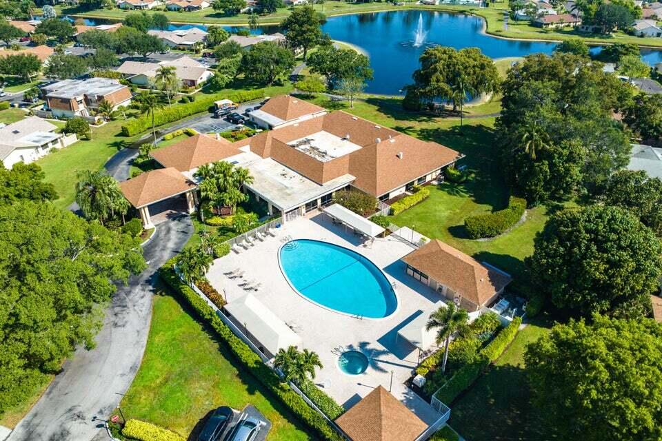 865 Northwest 29th Avenue, Unit D Delray Beach, FL 33445 - Photo 51 of 70 an aerial view of residential house with outdoor space and swimming pool