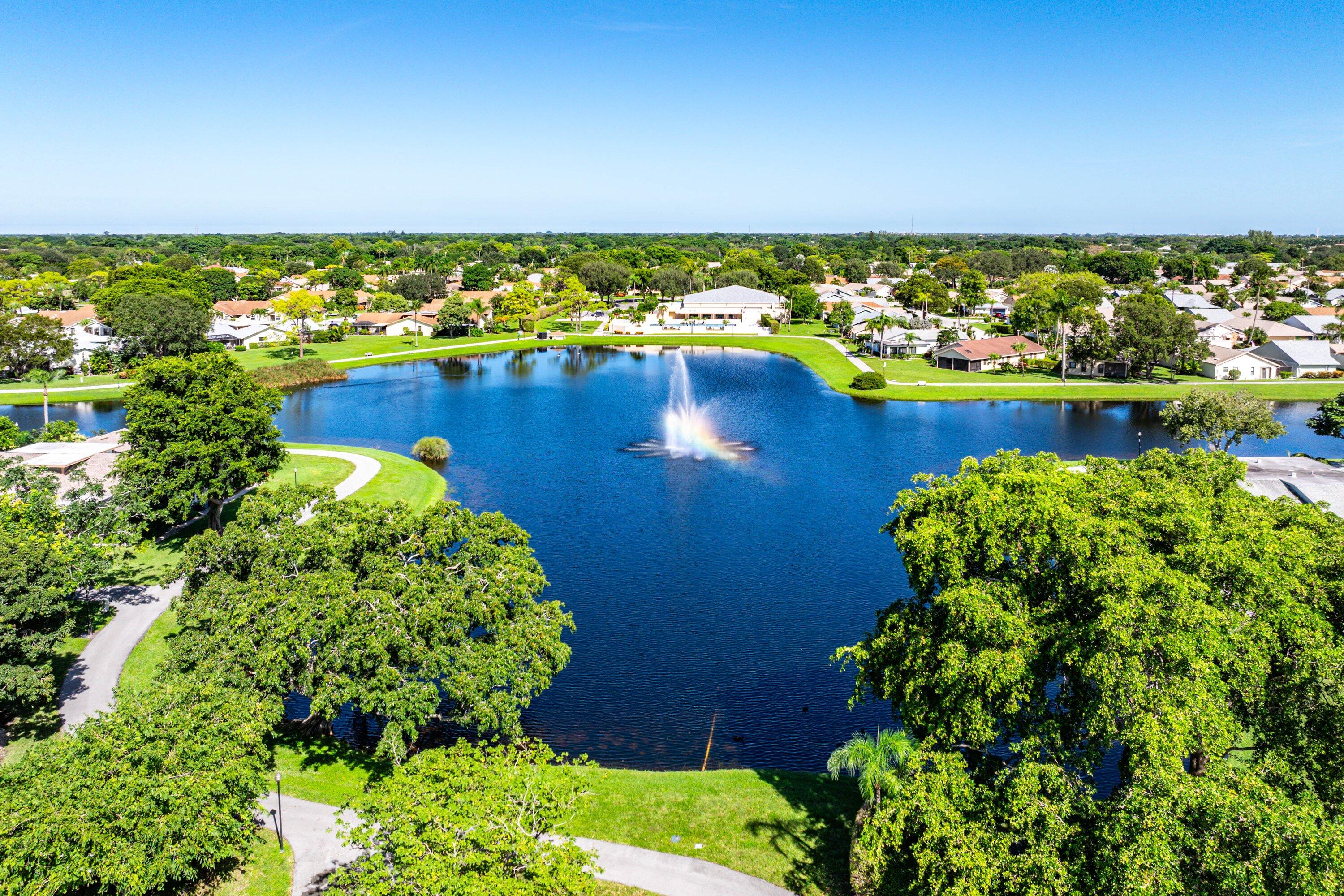 865 Northwest 29th Avenue, Unit D Delray Beach, FL 33445 - Photo 64 of 70 a view of a lake with a city