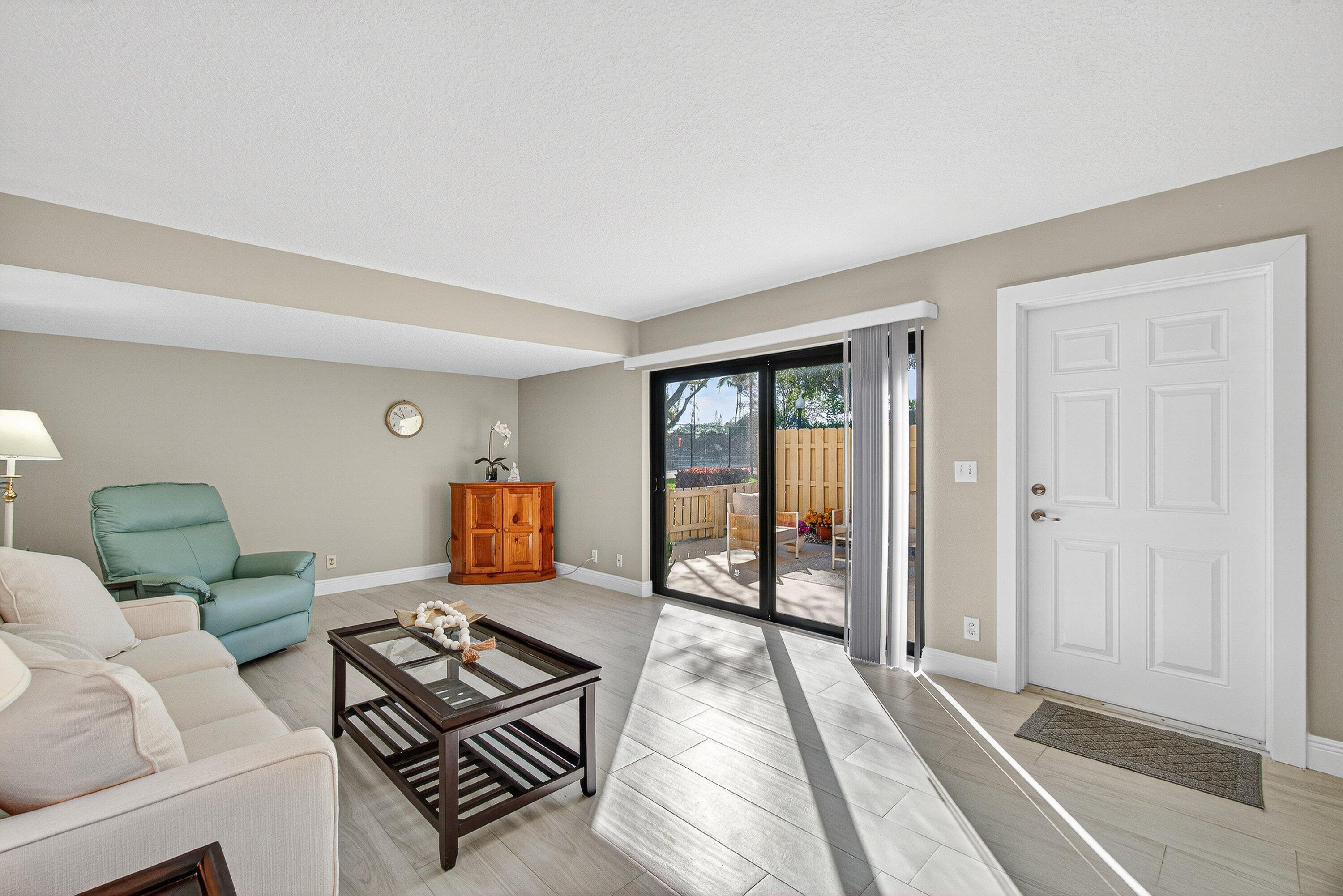 865 Northwest 29th Avenue, Unit D Delray Beach, FL 33445 - Photo 7 of 70 a living room with furniture