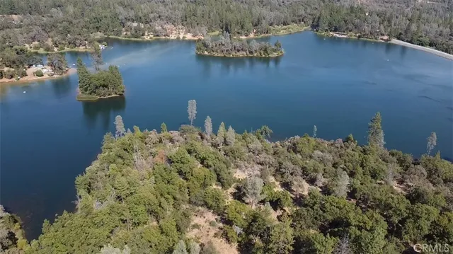 a view of a lake with a building in the background
