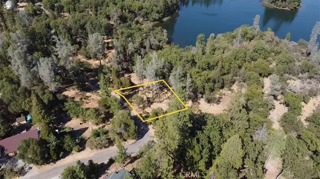 an aerial view of residential house with parking space