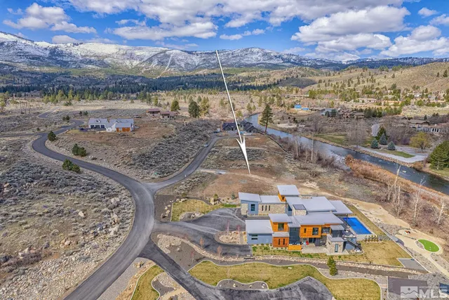 a view of a swimming pool with a lake view