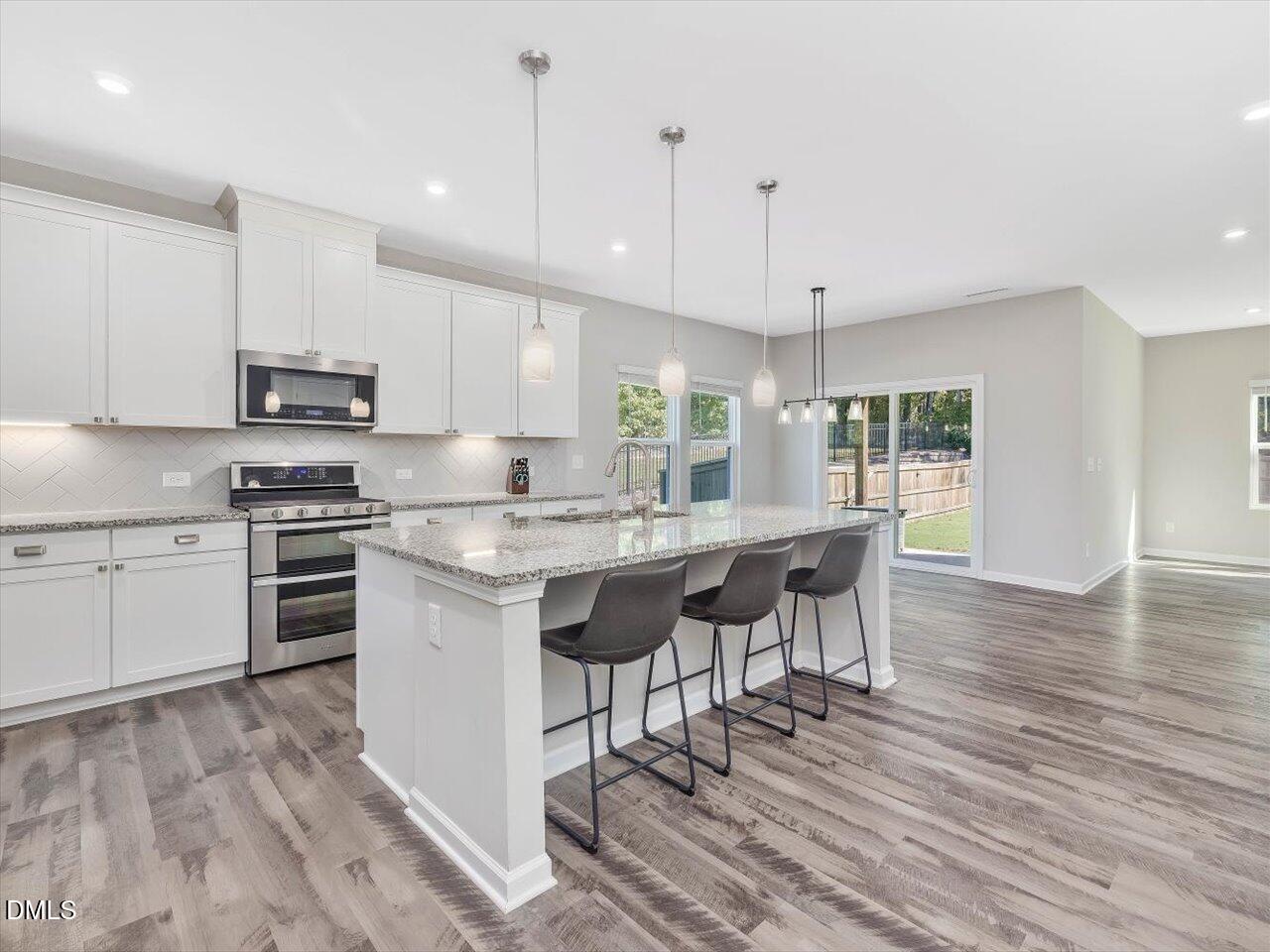1205 Watcher Way Apex, NC 27502 - Photo 3 of 30 12-Kitchen