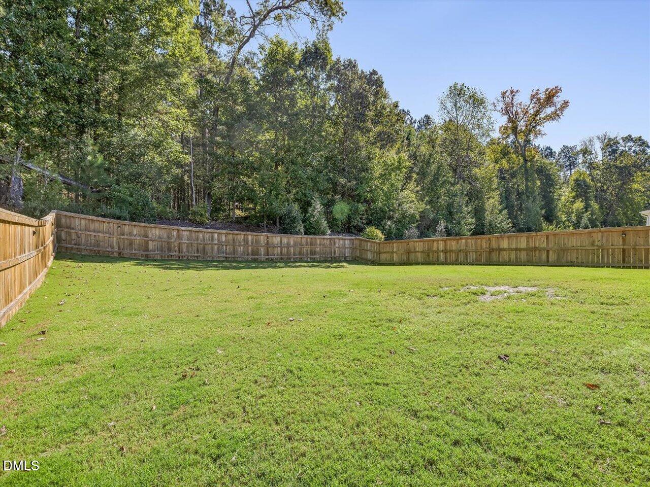 1205 Watcher Way Apex, NC 27502 - Photo 6 of 30 63-Fenced Yard