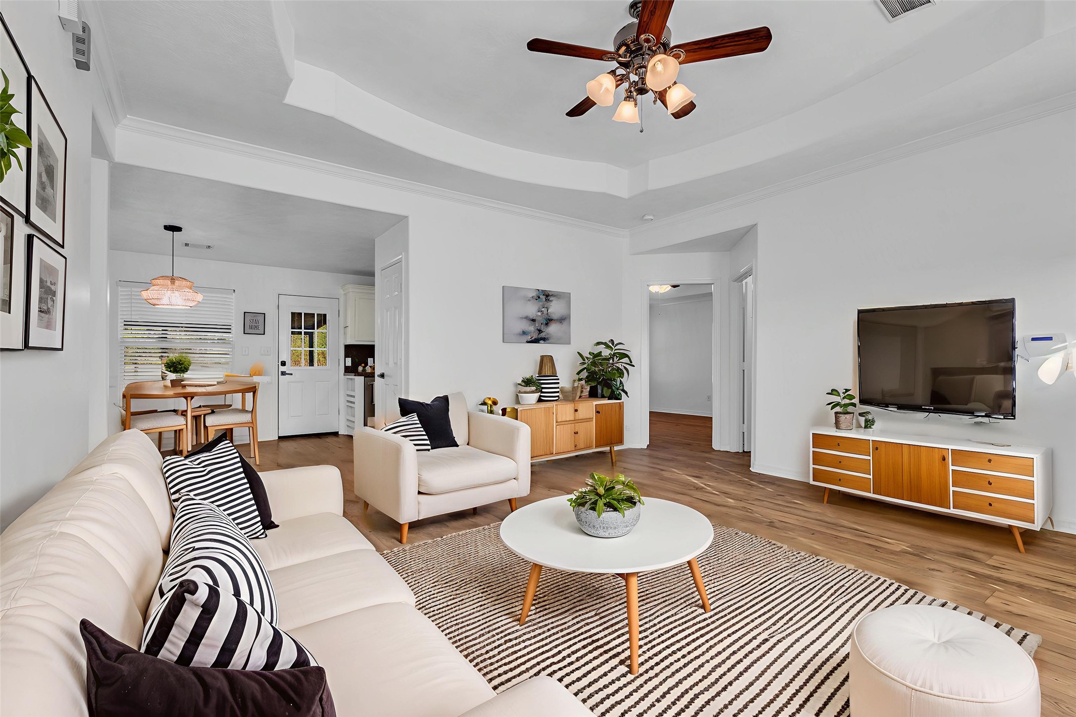 3862 Highline Oaks West Conroe, TX 77306 - Photo 4 of 23 a living room with furniture and a flat screen tv