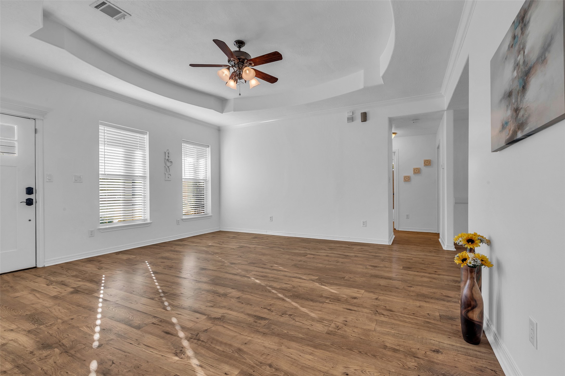 3862 Highline Oaks West Conroe, TX 77306 - Photo 6 of 23 a view of empty room with wooden floor and fan
