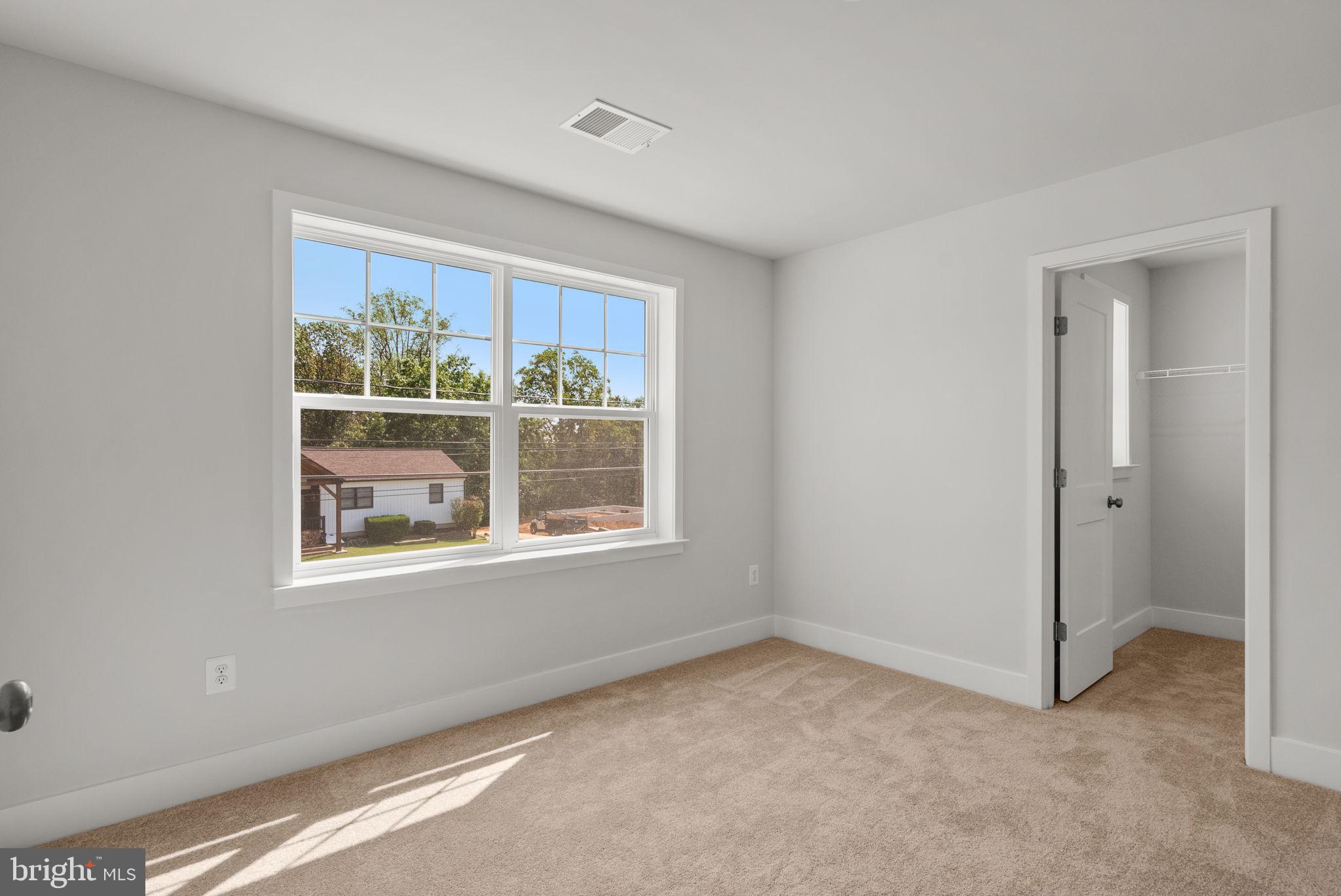 9420 Fairview Avenue Laurel, MD 20723 - Photo 34 of 70 a view of an empty room with a window