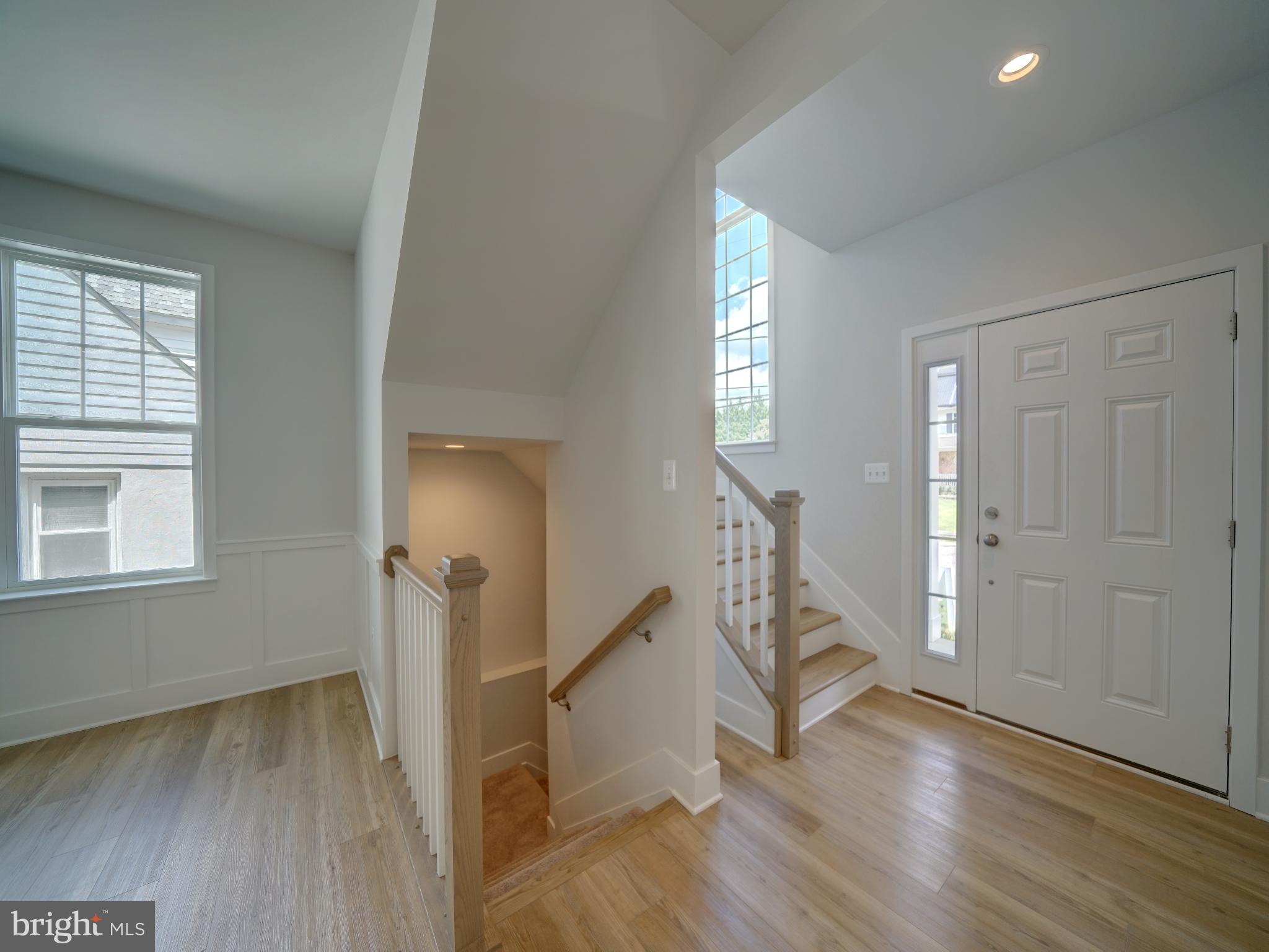 9420 Fairview Avenue Laurel, MD 20723 - Photo 55 of 70 a view of an entryway with wooden floor and stairs