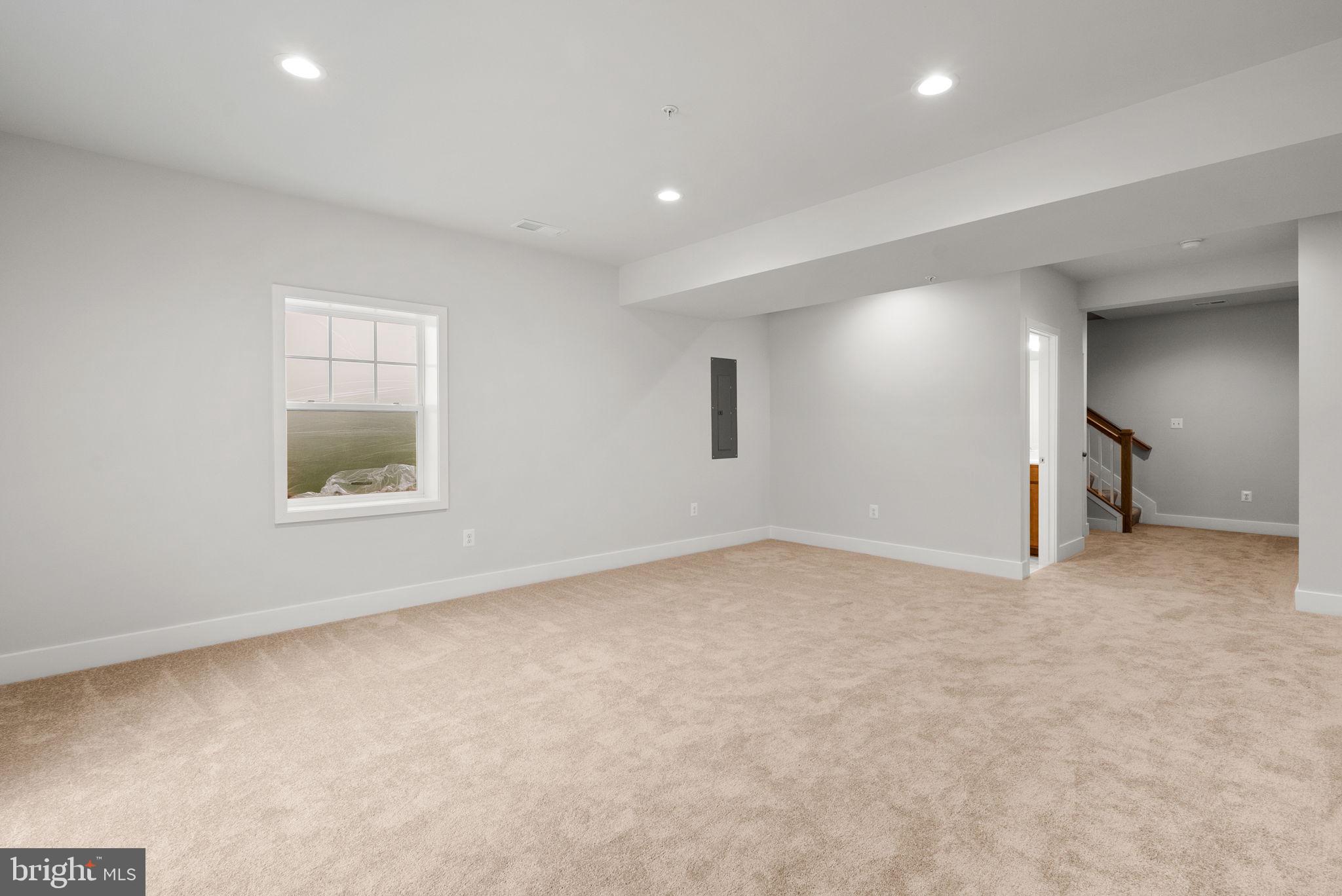 9420 Fairview Avenue Laurel, MD 20723 - Photo 58 of 70 an empty room with a window and a bathroom