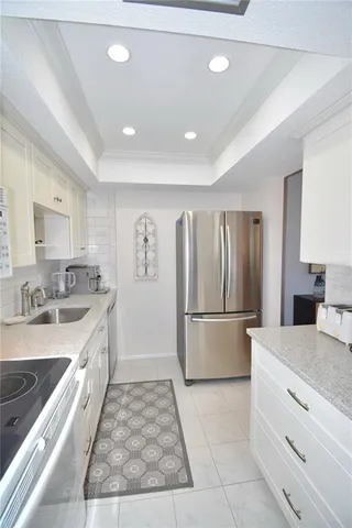 a view of a dining room with furniture and window