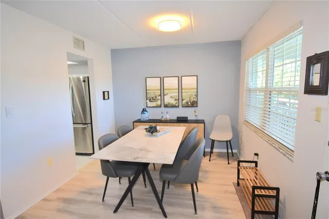 a view of a dining room with furniture