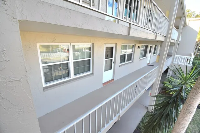 a view of a house with a large window