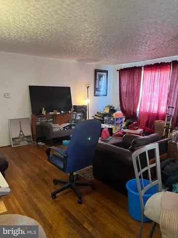 a room with furniture workspace and a window