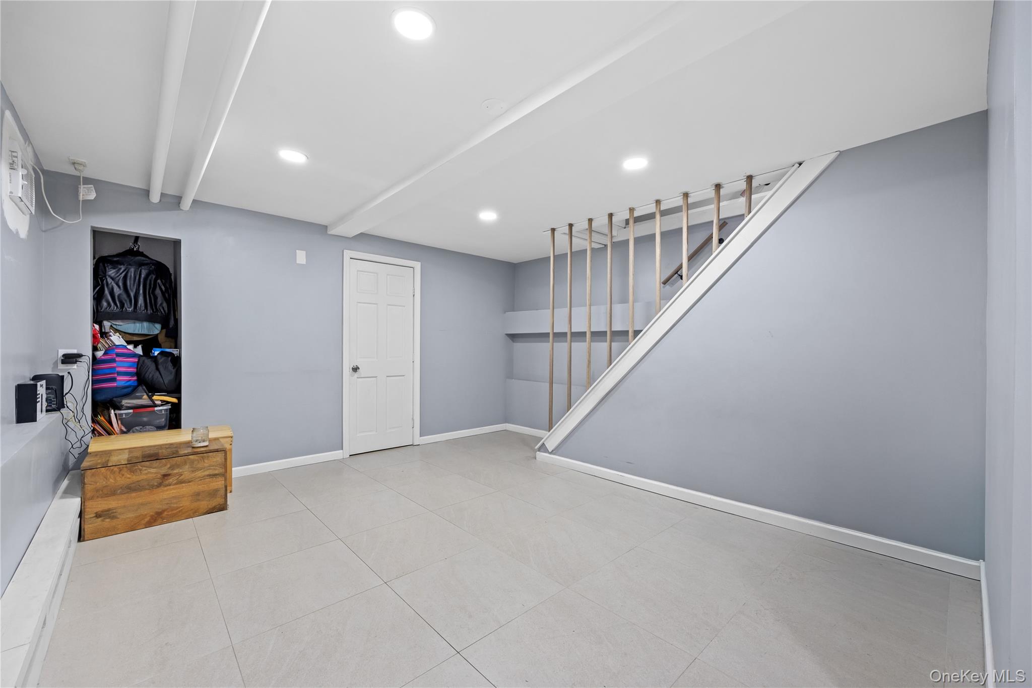 22-29 73rd Street Queens, NY 11370 - Photo 14 of 24 Basement featuring recessed lighting