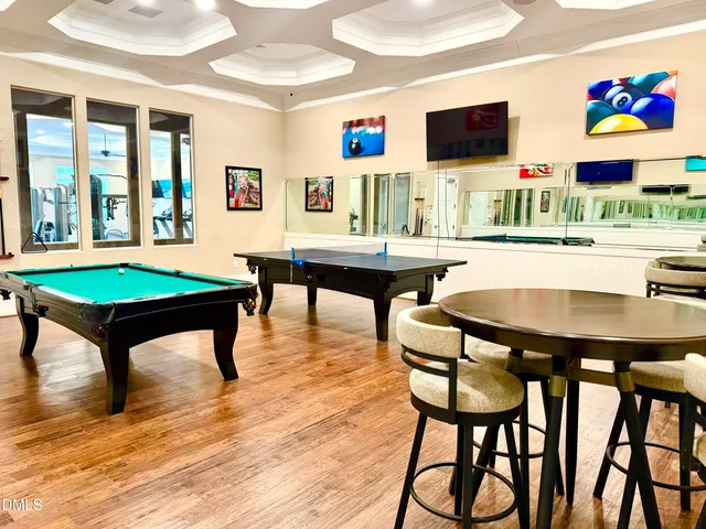 a large white kitchen with lots of counter space