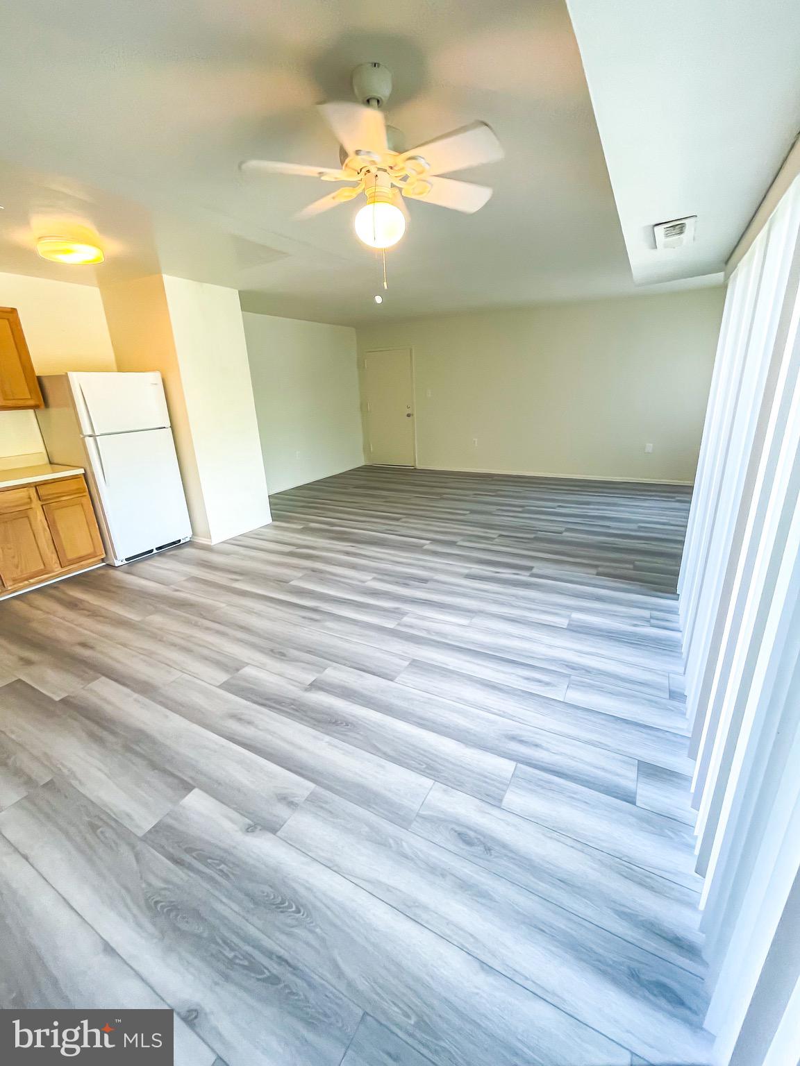 3840 Bel Pre Road, Unit 7 Silver Spring, MD 20906 - Photo 7 of 31 Open - Concept Living Room/ Dining Room/ Kitchen