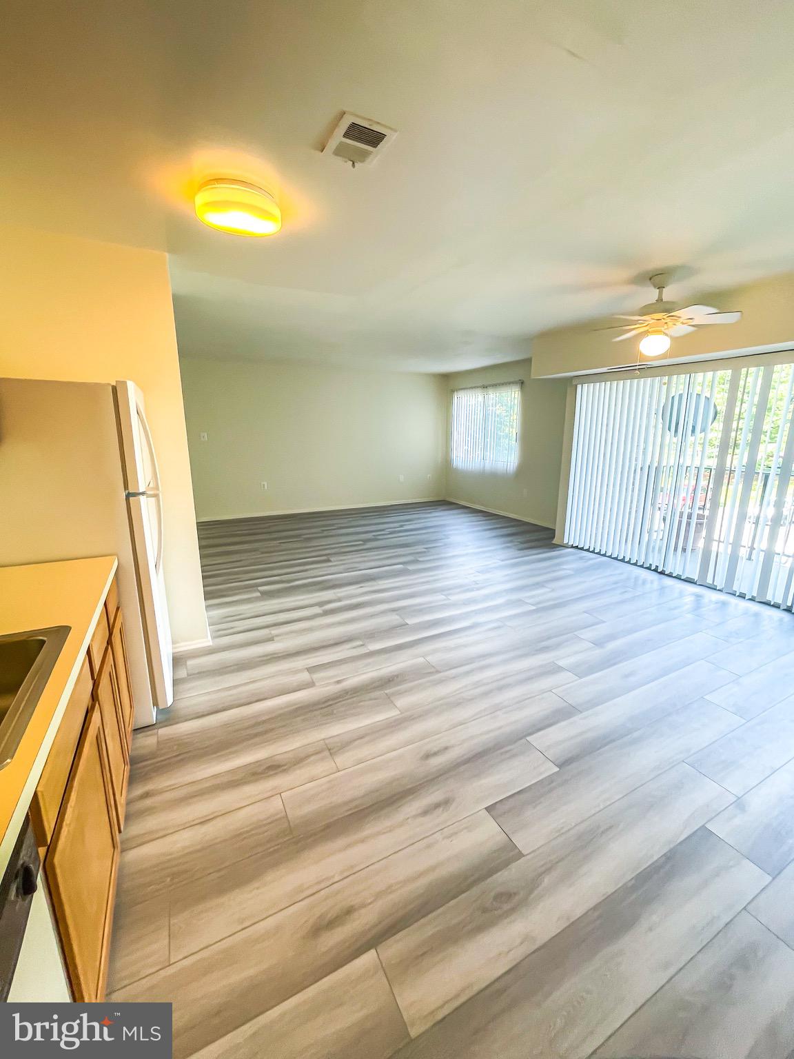 3840 Bel Pre Road, Unit 7 Silver Spring, MD 20906 - Photo 8 of 31 Open - Concept Living Room/ Dining Room/ Kitchen