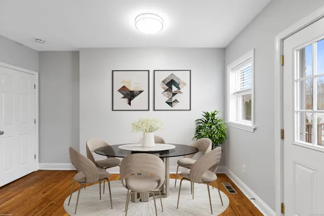 a bathroom with a granite countertop sink toilet bathtub and shower