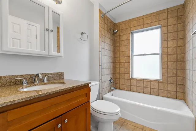 a view of a balcony with chairs