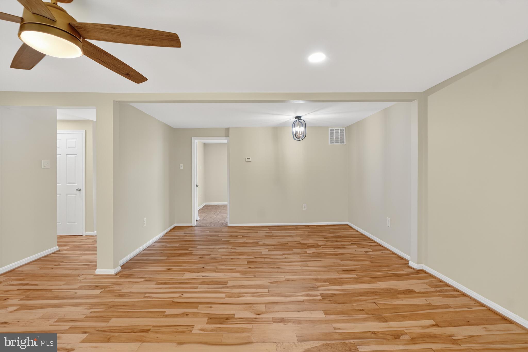 1232 Palmer Road, Unit 111 Fort Washington, MD 20744 - Photo 15 of 45 a view of empty room with wooden floor
