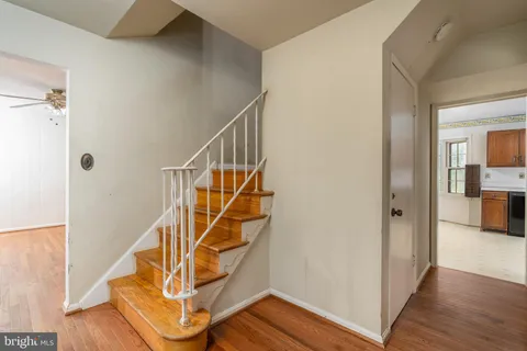 a view of entryway with wooden floor